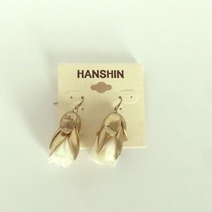 Rose cream and bronze earnings